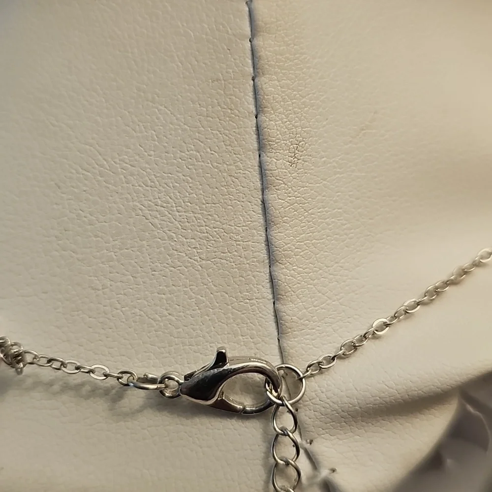 Elegant Silver Necklace with Purple Pendant